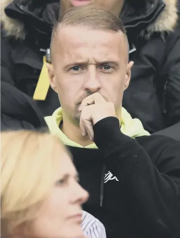  ??  ?? 0 Leigh Griffiths watches as Celtic beat Aberdeen 3-0 in Sunday’s Scottish Cup semi-final at Hampden.