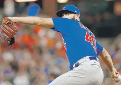  ??  ?? Jake Arrieta held the Orioles to one earned run in 6⅔ innings in his first appearance at Camden Yards since being traded. | AP