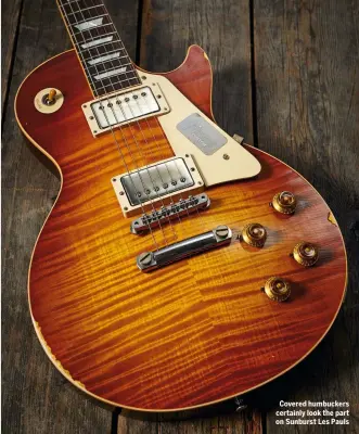  ??  ?? Covered humbuckers certainly look the part on Sunburst Les Pauls