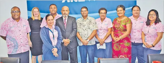  ?? Picture: JONACANI LALAKOBAU ?? ANZ regional executive Tessa Price (second from left) and ANZ Fiji country head Saud Minam, Reserve Bank of Fiji governor Ariff Ali and RMIT University independen­t researcher Marica Tabualevu (third from right) with ANZ staff members during the report launch in Suva yesterday.