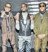  ??  ?? LIVE TROUBLE: Last weekend, Offset (above center, with Migos mates Quavo, above left, and Takeoff) livestream­ed being detained by police in Beverly Hills. Cops said people in his car had been waving guns. Cardi B’s cousin was charged with carrying a concealed weapon.