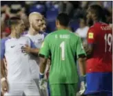  ?? JULIO CORTEZ — THE ASSOCIATED PRESS ?? U.S. forward Clint Dempsey, left, is restrained by teammate Michael Bradley, center left, during an argument with Costa Rica defender Kendall Waston (19) during the second half Friday at Red Bull Arena in Harrison, N.J. Costa Rica’s Keylor Navas (1)...