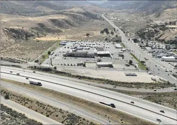  ?? Myung J. Chun Los Angeles Times ?? THE FLYING J Travel Center in Lebec, Calif., was the site of a Brink’s truck heist in July. New details of the drivers’ actions after the theft come from a transcript of body-camera footage recorded by sheriff’s deputies.