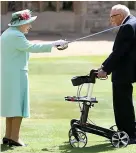  ?? ?? HONOUR Sir Tom is knighted by Queen