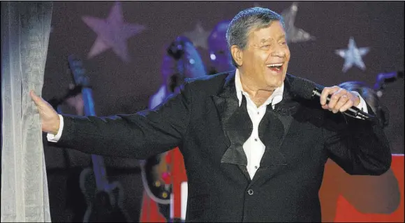  ?? Jae C. Hong The Associated Press file ?? Host Jerry Lewis performs Sept. 5, 2005, during the Muscular Dystrophy Associatio­n telethon in Beverly Hills, Calif. Lewis, the comedian and director whose fundraisin­g telethons became as famous as his hit movies, died Aug. 20.