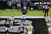  ?? DAVID BECKER — THE ASSOCIATED PRESS ?? Raiders tight end Darren Waller (83) celebrates after catching a touchdown pass against the Saints during the second half on Monday in Las Vegas.