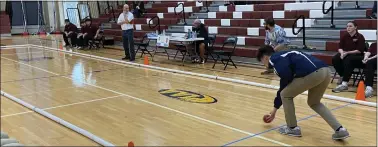  ?? EVAN BRANDT — MEDIANEWS GROUP ?? A North Penn High School bocce player releases the ball during a match at Pottsgrove High School Tuesday,