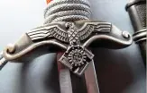  ??  ?? Right: The TeNo leader dagger crossguard was ornate compared to most daggers of the Third Reich (warrelics.eu)