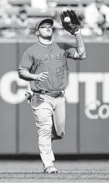  ?? Scott Kane / Getty Images ?? Though limited to 134 games, Mike Trout hit a career-high 45 homers and drove in 104 runs, and his 1.083 OPS led the AL.