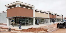  ?? [PHOTO BY ERIECH TAPIA, FOR THE OKLAHOMAN] ?? Redevelopm­ent of the Bryant Square shopping center is bringing new and varied businesses to east Edmond.