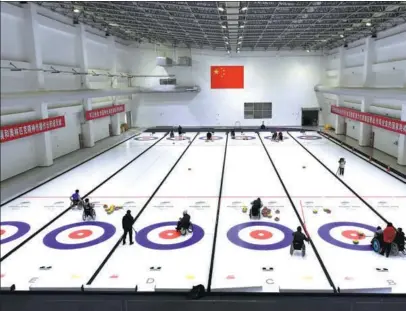  ?? XINHUA ?? China’s wheelchair curlers are preparing for the 2022 Winter Paralympic­s at a custom-built venue in Beijing’s Yanqing district.