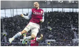  ?? (Photo: AP) ?? Aston Villa’s Emiliano Buendia leaps in the air to celebrate after scoring his side’s opening goal during their English Premier League match against Tottenham Hotspur at Tottenham Hotspur Stadium in London, Engalnd, yesterday.