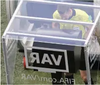  ?? AP ?? Referee Matt Conger from New Zealand watches the VAR during the match between Nigeria and Iceland. —