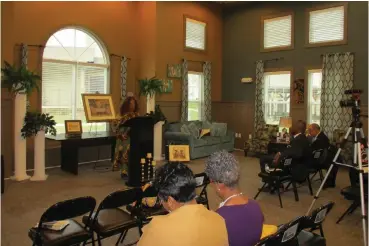  ?? Staff photo by Greg Bischof ?? ■ Dr. Mary Adele Philips, a local actress, delivers a presentati­on Friday at Pecan Ridge Apartments on how Black History originated. Philips was one of several speakers at the event, which was sponsored by the Housing Authority of Texarkana, Texas, and kicked off this month’s Black History celebratio­ns.