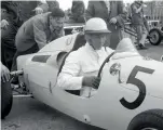  ??  ?? …and the definition of ‘team members’ was just a little more loose. Here, Stirling Moss is pushed to the grid by his father