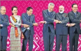  ??  ?? Prime Minister Narendra Modi with Asean leaders in Bangkok on Sunday.
REUTERS