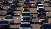  ?? PHOTO: XAVIER MASCARENAS — SACRAMENTO BEE ?? Traffic moves southbound on Highway 99 in 2022. Previously, the Legislativ­e Analyst's Office raised doubts about a new California Air Resources Board plan to achieve reductions in greenhouse gases by 2030.