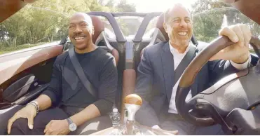  ??  ?? Driving Mr. Murphy: In Season 11 opener of Netflix’s Comedians in Cars Getting Coffee, Jerry Seinfeld ferries around Eddie Murphy in a Porsche Carrera GT.