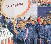  ??  ?? Telangana girls take the salute during the opening ceremony of the 34th Youth National Basketball Championsh­ip at the Indoor Stadium in Gachibowli, Hyderabad.