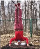  ?? ?? Tony Helou, 75, performs handstand.