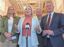  ?? VIA GETTY IMAGES PAUL FAITH/AFP ?? Sinn Fein leader Michelle O’Neill, center, says the Democratic Unionist Party is “disgracefu­lly holding the public to ransom for their Brexit mess.”