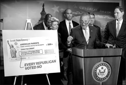  ?? J. SCOTT APPLEWHITE / ASSOCIATED PRESS FILE (2021) ?? Senate Majority Leader Chuck Schumer, D-N.Y., speaks about the benefits of the Child Tax Credit July 15, 2021, at a news conference at the Capitol in Washington.
