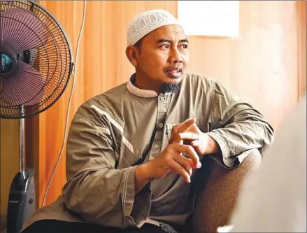  ?? AFP ?? Rumah Ruqyah cleric Ahmad Sadzali speaking about exorcisms for people from the LGBT community in Jakarta. Homosexual­ity is legal everywhere in Indonesia except in conservati­ve Aceh province which adheres to strict Islamic laws.