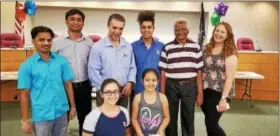  ??  ?? Dunkin Donuts contest winner photo - Jinal Patel , Joe Kilroy and Dunkin Donuts staff with Big Buddy winner Laura Rendon and Little Buddy winner Jasmine Phogat.