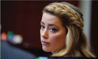  ?? ?? Amber Heard at the courthouse in Fairfax, Virginia, in May. Photograph: Steve Helber/AFP/Getty Images