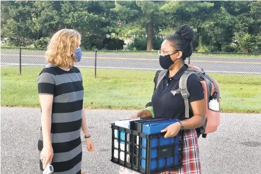  ?? COURTESY PHOTOS ?? Students at Rockbridge Academy brought milk crates to keep their personal items close and minimize hallway traffic.