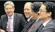  ?? PICTURE: TRACEY ADAMS ?? VINDICATED: At the ruling in the misconduct hearing of sports scientist Tim Noakes (second left) yesterday are senior counsel Mike van der Nest, left, advocate Ravin Ramdass, second from right, and attorney Adam Pike, right.