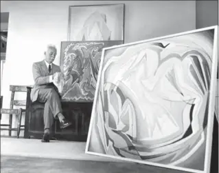  ?? COURTESY MCMICHAEL COLLECTION ?? Lawren Harris at Vancouver’s Belmont Street studio with his abstract canvases in the 1950s. Higher States ends with the work on the right, leaving Harris’s final artistic chapter to another Harris exhibition to complete the picture.