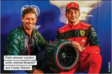  ?? ?? Pole winner Leclerc with retired Motogp ace Casey Stoner