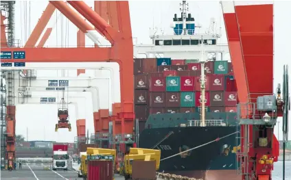  ?? / AP
EDITOR: KATLENE O. CACHO-LAUREJAS / business@sunstar.com.ph ?? TRADE DEAL. A crane prepares to unload a container from a semi-trailer truck at the Aomi wharf in Tokyo on Sept. 17, 2021. The Office of the U.S. Trade Representa­tive on Friday, Sept. 23, 2022, released its negotiatin­g objectives for the Indo-Pacific Economic Framework, a deal with the 12 nations launched in May. Among them, the U.S. wants the Indo-Pacific countries to improve their labor and environmen­tal standards and ensure their markets remain open to competitio­n, while also taking steps to ease supply-chain backlogs at border crossings.