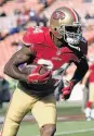  ?? Paul Sakuma / Associated Press ?? Niners head coach Jim Harbaugh, left, says he appreciate­s Randy Moss’ love of the game.