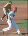  ?? NEWS PHOTO SEAN ROONEY ?? Medicine Hat Mavericks' Colton Wright (bottom) rounds third base during Western Major Baseball League action against the Edmonton Prospects and third baseman Michael Gahan Wednesday at Athletic Park.