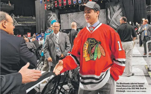  ??  ?? The Blackhawks selected forward Vinnie Hinostroza with the 169th overall pick of the 2012 NHL Draft in Pittsburgh.
| BRUCE BENNETT/ GETTY IMAGES