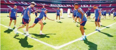  ?? Courtesy: Atletico Madrid website ?? ↑
Atletico Madrid players attend a training session on Saturday.