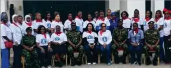  ?? ?? Wives of Naval Wives Officers Associatio­n with Commander of the Nigerian Navy Reference Hospital, Navy Town, Surgeon Captain Ikechukwu Chukwuka (fourth left)