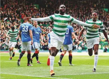  ?? Reuters ?? Celtic’s Odsonne Edouard celebrates after scoring the first goal against Rangers in a Scottish Premiershi­p match in Glasgow yesterday.