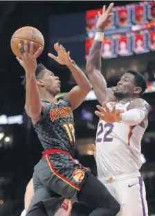  ?? JOHN BAZEMORE/ASSOCIATED PRESS ?? Atlanta Hawks forward De'Andre Hunter led the Virginia Cavaliers to their first NCAA title one year ago during a thrilling tournament run.