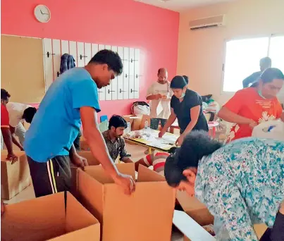  ?? Supplied photos ?? About 230 teachers, 49 administra­tion staff and 200 ancillary staff of the Kindergart­en Starters helped purchase and pack the relief material at the school premises during the three-day drive. —