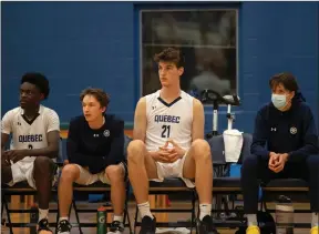  ?? ?? The Canadian Press
Team Quebec’s Olivier Rioux plays in a men’s basketball quarterfin­al game against Team Alberta at the 2022 Canada Summer Games in Welland, Ont. last Thursday. The 16-yearold Terrebonne, Que. native is 7-foot-6 and recognized by Guinness World Records as the tallest teen in the world.