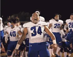  ?? ?? Jadan Ah Quin leads Chandler in their traditiona­l Haka pregame dance before the game against Queen Creek on Oct. 22.