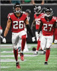  ?? CURTIS COMPTON / CCOMPTON@AJC.COM 2019 ?? Falcons cornerback Isaiah Oliver (26), who was asked to work on his footwork, and safety Damontae Kazee are expected to be starters this season.