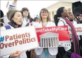  ?? Alex Wong
Getty Images ?? AFFORDABLE CARE ACT supporters rally in March. Many officials are hoping that the justices will side with the administra­tion and leave the law intact.