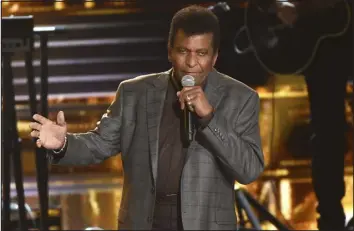  ?? CHARLES SYKES — INVISION VIA THE ASSOCIATED PRESS ?? Charley Pride performs “Kiss an Angel Good Mornin’ “at the 50th annual CMA Awards on Nov. 2, 2016, in Nashville, Tenn.