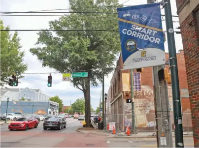  ?? STAFF PHOTO BY OLIVIA ROSS ?? On Sept. 15, a UTC Smart Corridor sign hangs on a pole along M.L. King Boulevard.