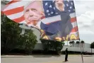  ?? Raedle/Getty Images ?? A flag showing support for Donald Trump flies outside a courthouse on 1 March in Fort Pierce, Florida. Photograph: Joe