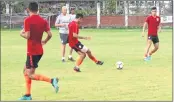  ??  ?? India’s coach Stephen Constantin­e keeps a close watch during a practice session with the Indian team in Dhaka on Tuesday.